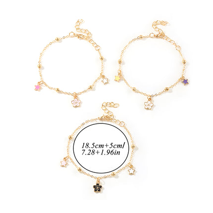 Pulsera Femenina De Metal Con Dijes De Flor O Planeta Y Flecos Modernos