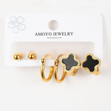 Aretes Chapado En Oro Con Aros Y Flor De Cuatro Hojas Diseño Elegante