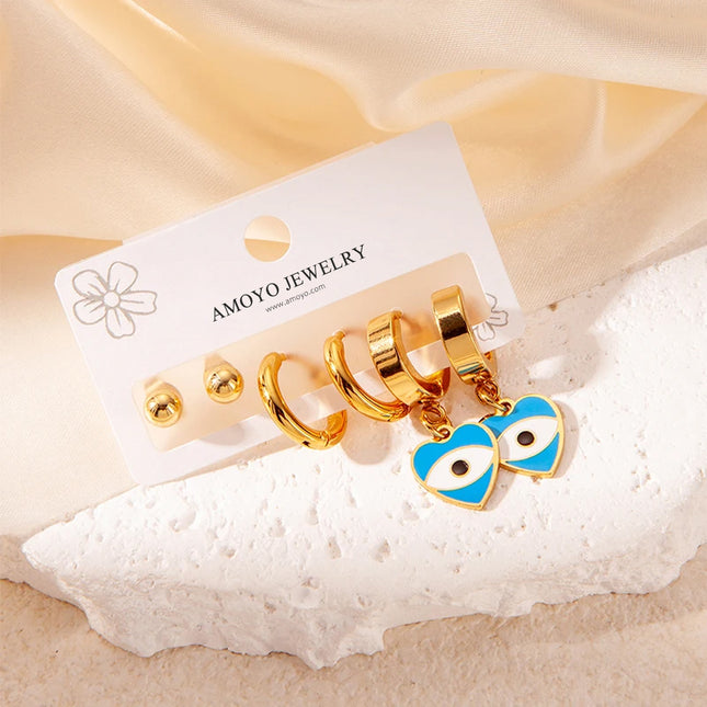 Aretes En Forma De Corazón Y Ojo En Acero De Titanio Set De Pendientes