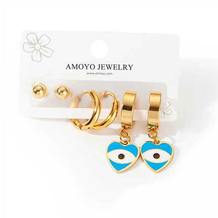 Aretes En Forma De Corazón Y Ojo En Acero De Titanio Set De Pendientes