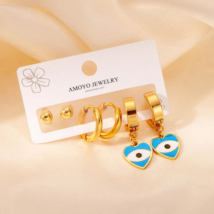 Aretes En Forma De Corazón Y Ojo En Acero De Titanio Set De Pendientes