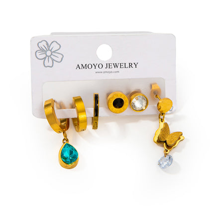 Set De Aretes De Titanio Con Mariposa, Zirconia Azul Y Números Romanos