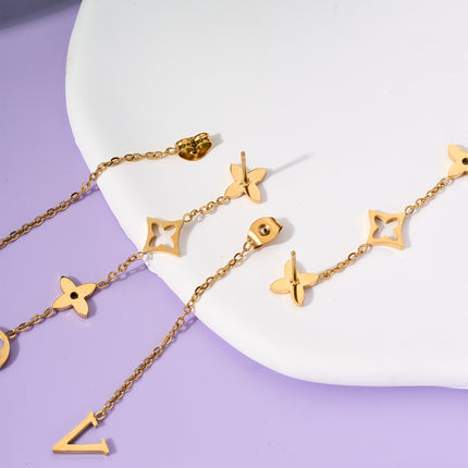 Aretes Largos Con Diseño De Trébol De Cuatro Hojas En Acero De Titanio