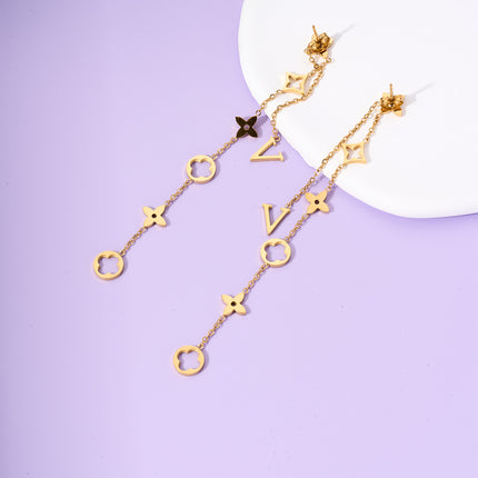Aretes Largos Con Diseño De Trébol De Cuatro Hojas En Acero De Titanio