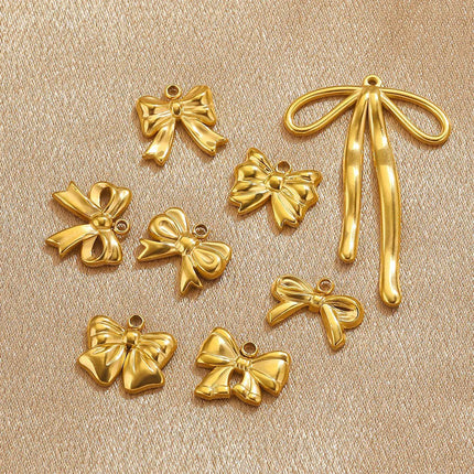 4PCS Set Colgantes De Acero Inoxidable Lazo Dorado Diferentes Diseños